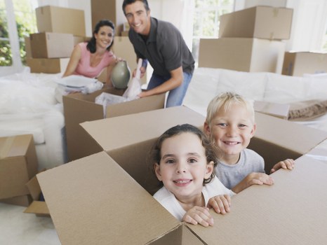 Moving team loading boxes and furniture for a home removal in Belgium
