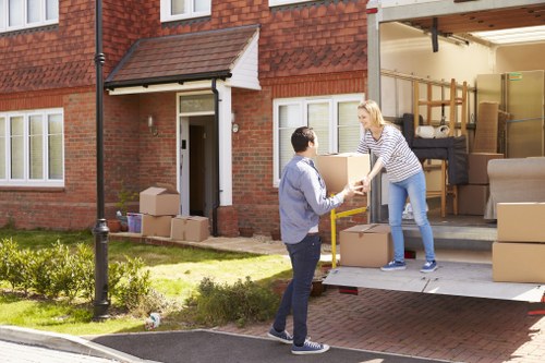 Moving team handling a residential relocation in Belgium