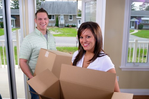 Loading household items into a removal van in Belgium