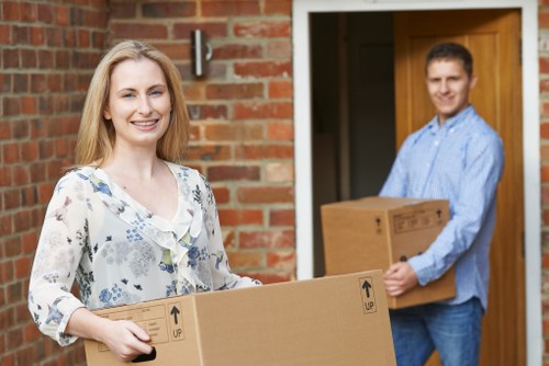 Moving team handling an apartment relocation in Belgium