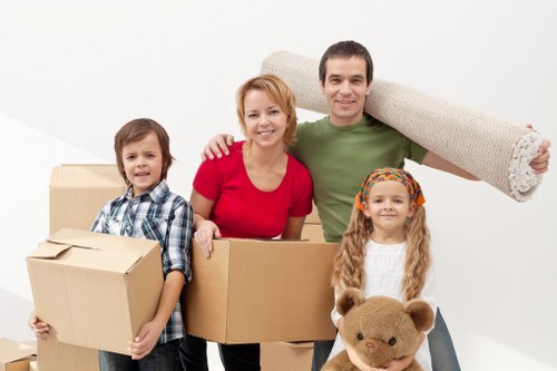 Packed boxes and wrapped furniture ready for a house move in Belgium