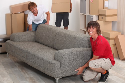 Packed moving boxes prepared for transport by a local removal company