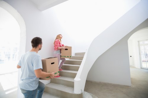 Man with van moving items between Belgian neighborhoods