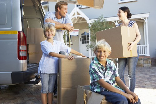 Moving service navigating Belgian city streets and apartment access