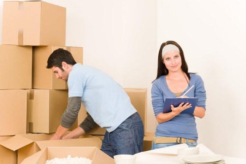 Loading furniture into a van for transport in Belgium