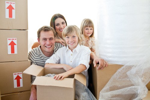 Loading boxes and furniture into a removal van