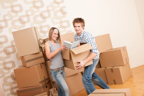 Moving truck loaded with boxes and household belongings for a Belgian house move