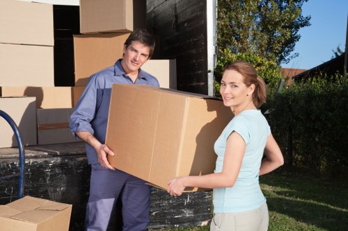 Packed boxes and household items ready for a man with a van