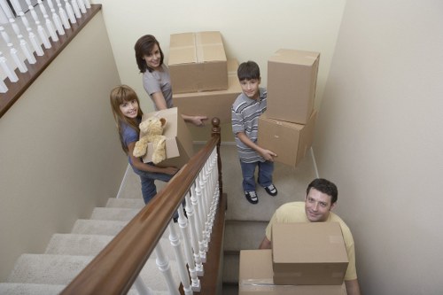 Loading boxes and household items into a van for a local move